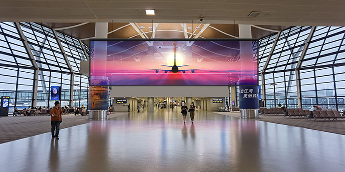 P3.91 High-Transparency Holographic LED Screen from Milestrong Suspended in Airport Hall