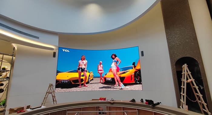 A P1.8 Curved LED Display in a Real Estate Sales Center Creates an Impressive First Impression